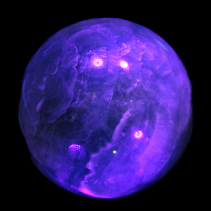 Large Green Fluorite sphere 2563g in UV light