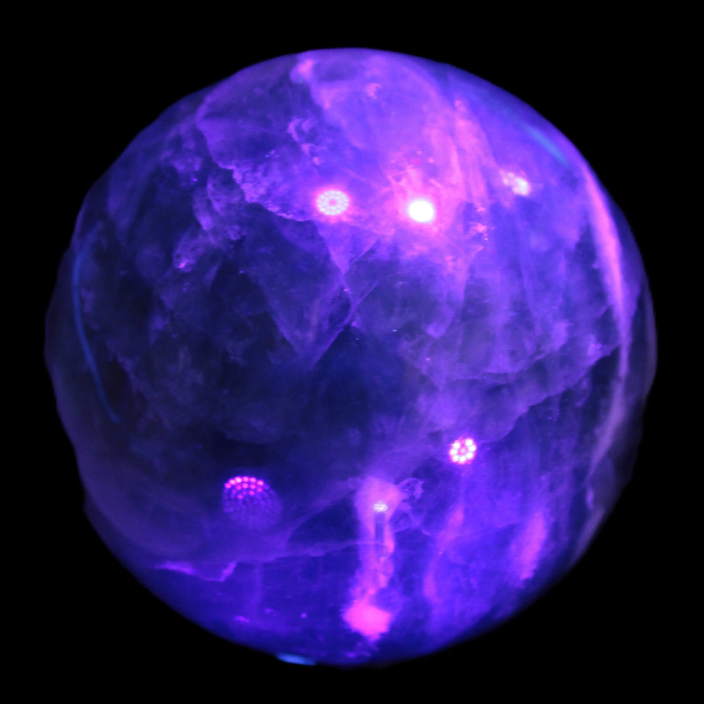 Large Green Fluorite sphere 2563g in UV light