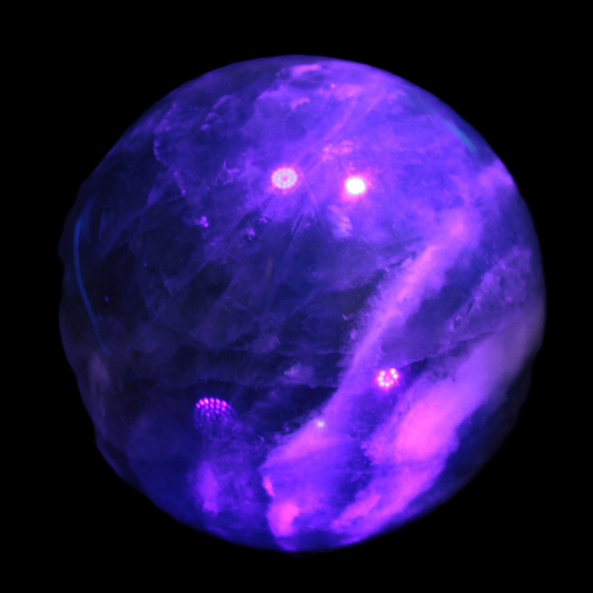 Large Green Fluorite sphere 2563g in UV light