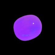 Mangano Calcite UV bright-pink-reactive tumbled stone 4-6g Rocks and Things