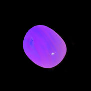 Mangano Calcite UV bright-pink-reactive tumbled stone 4-6g Rocks and Things