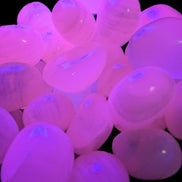 Mangano Calcite UV bright-pink-reactive tumbled stone 4-6g Rocks and Things
