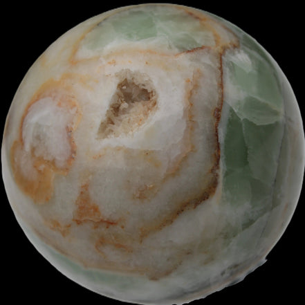 Orange, Lime & Lemon Aragonite sphere 648g in sunlight - Rocks and Things Store