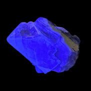 Fluorite cubic cluster UV reactive 328g in UV light -  Rocks and Things Store