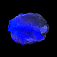 Fluorite cubic cluster UV reactive 328g in UV light -  Rocks and Things Store