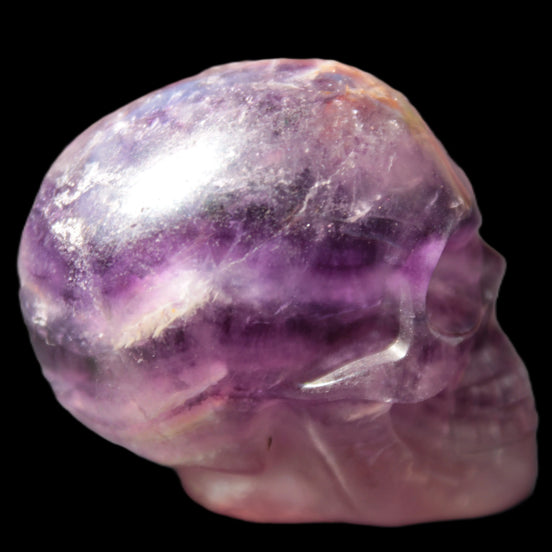 Purple Fluorite skull 50*34*49mm 108g in sunlight - Rocks and Things Store