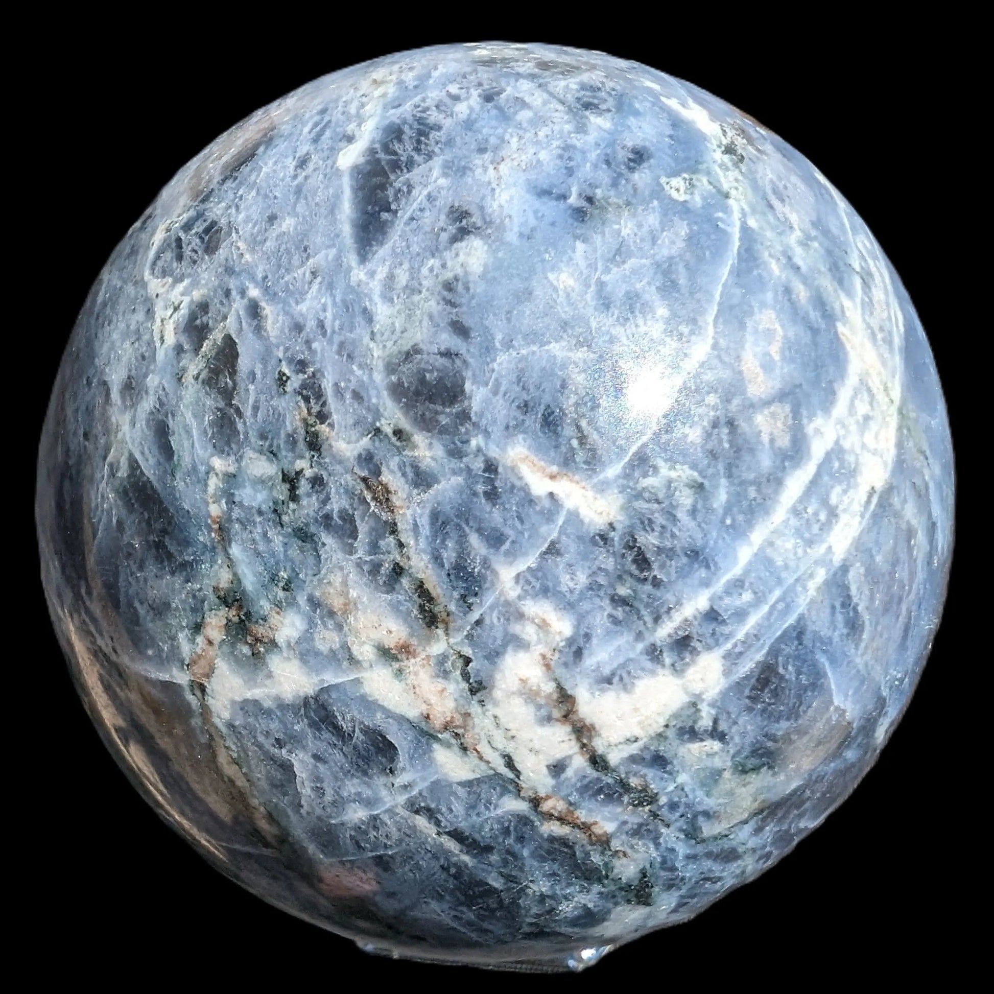 Sodalite sphere 473g Rocks and Things