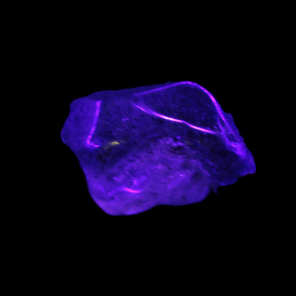 Super Seven Amethyst polished crystal 7g Rocks and Things Store in UV light