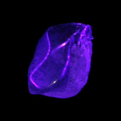 Super Seven Amethyst polished crystal 7g Rocks and Things Store in UV light