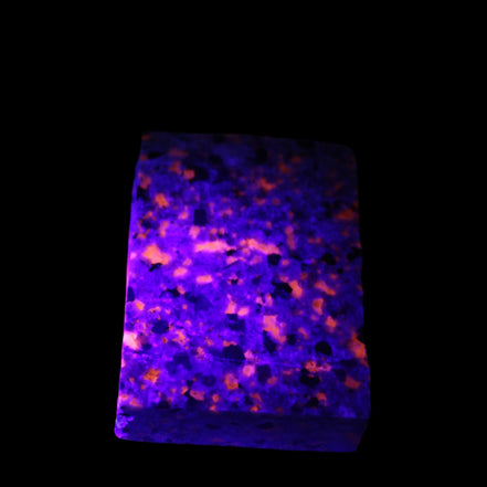 Yooperlite Lake Superior Sodalite 121g in UV light - Rocks and Things Store