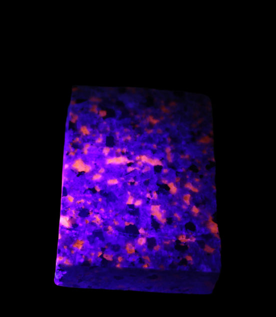 Yooperlite Lake Superior Sodalite 121g in UV light - Rocks and Things Store
