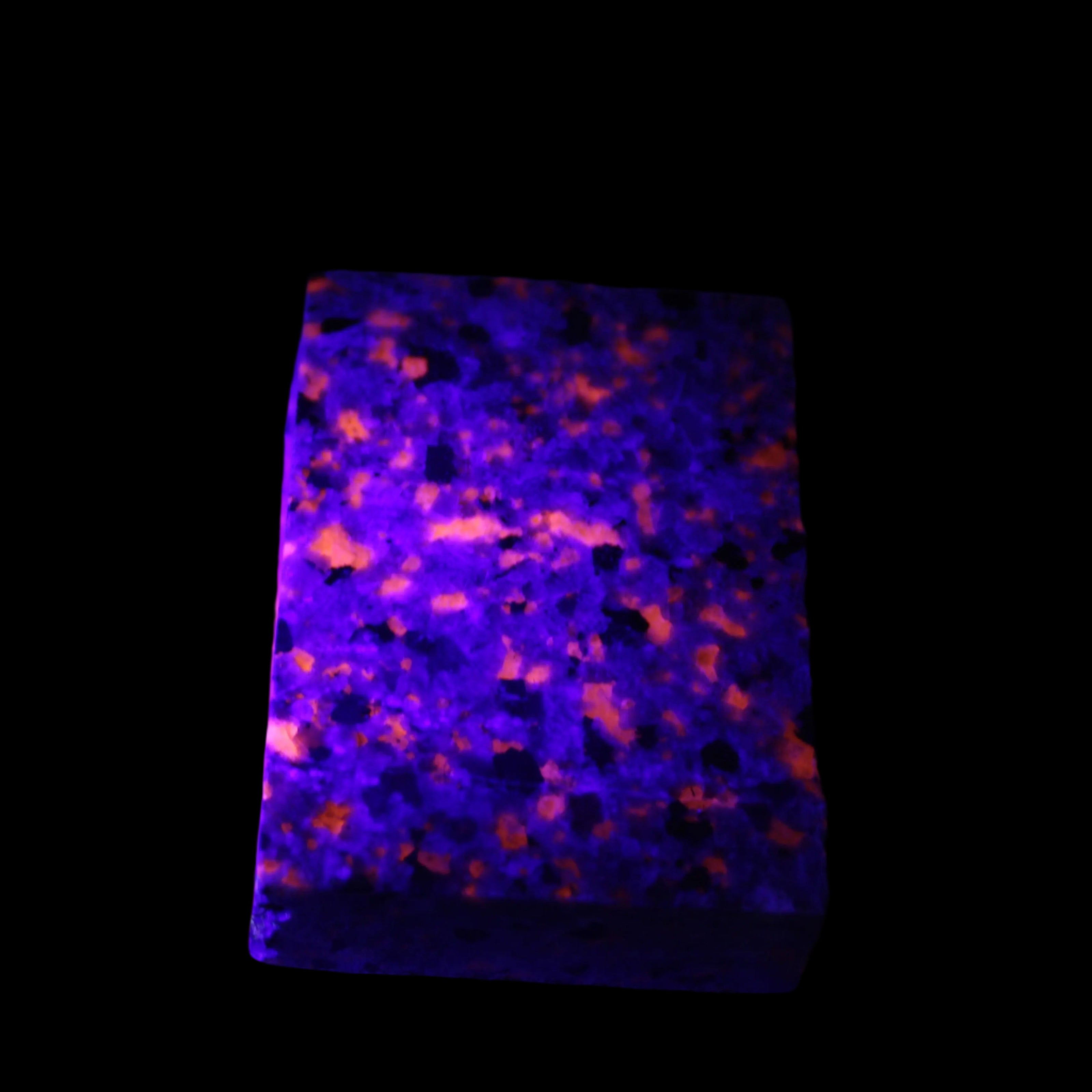 Yooperlite Lake Superior Sodalite 121g in UV light - Rocks and Things Store