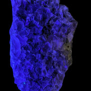 Purple/green Fluorite cluster 243g in LED light - Rocks and Things Store