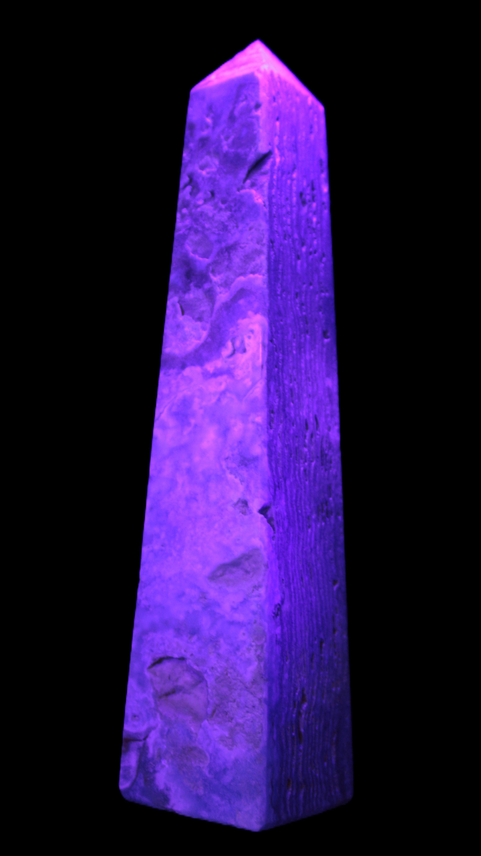 Caribbean Calcite obelisk 263*54*56mm 1271g in UV light - Rocks and Things Store