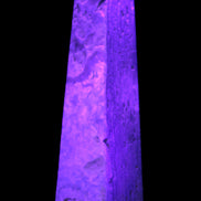 Caribbean Calcite obelisk 263*54*56mm 1271g in UV light - Rocks and Things Store