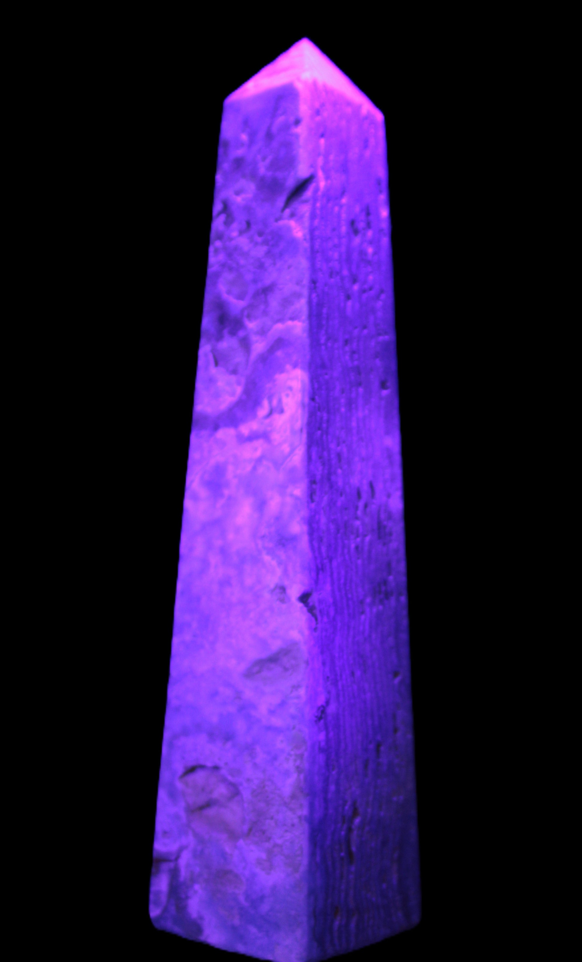 Caribbean Calcite obelisk 263*54*56mm 1271g in UV light - Rocks and Things Store