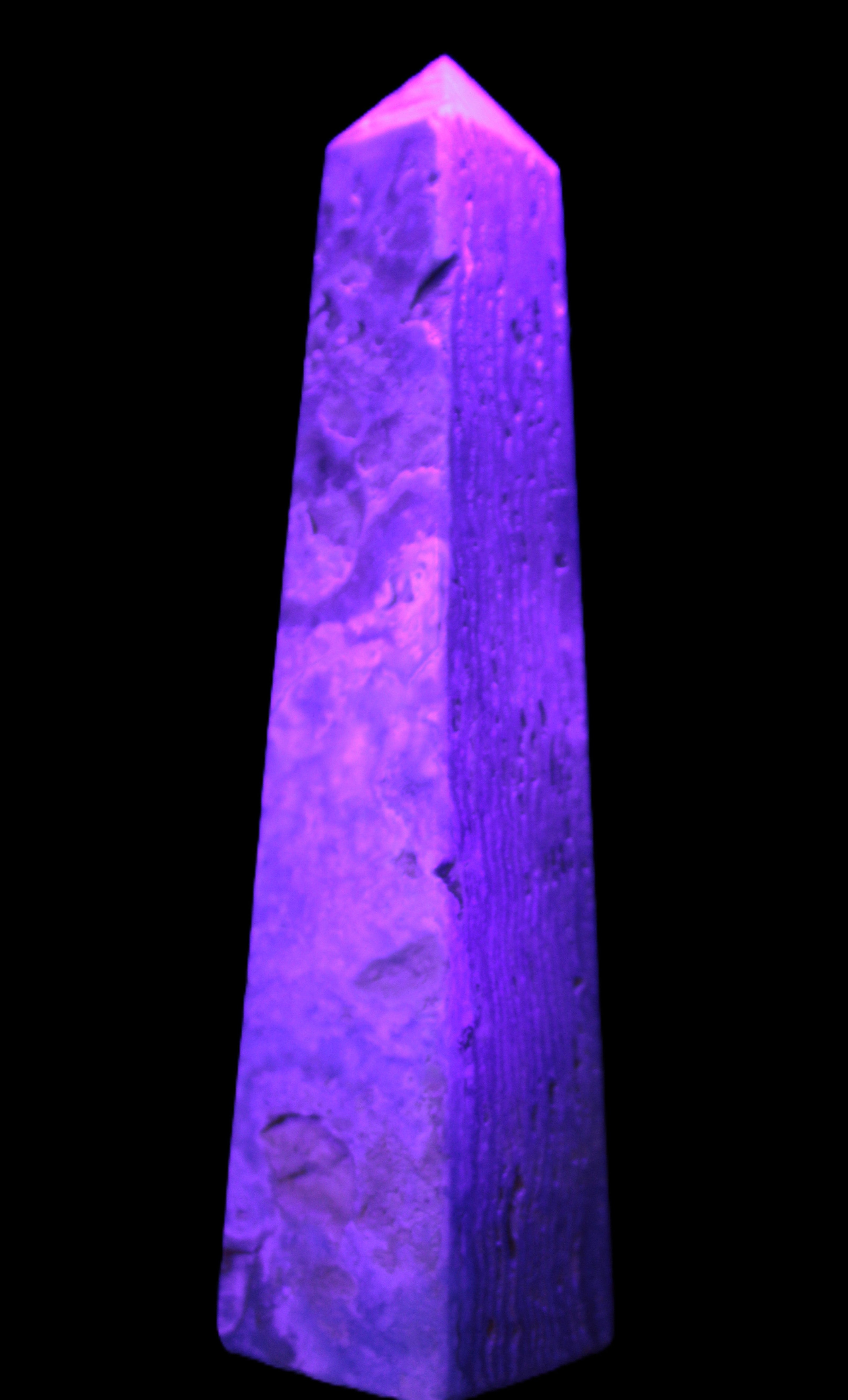 Caribbean Calcite obelisk 263*54*56mm 1271g in UV light - Rocks and Things Store