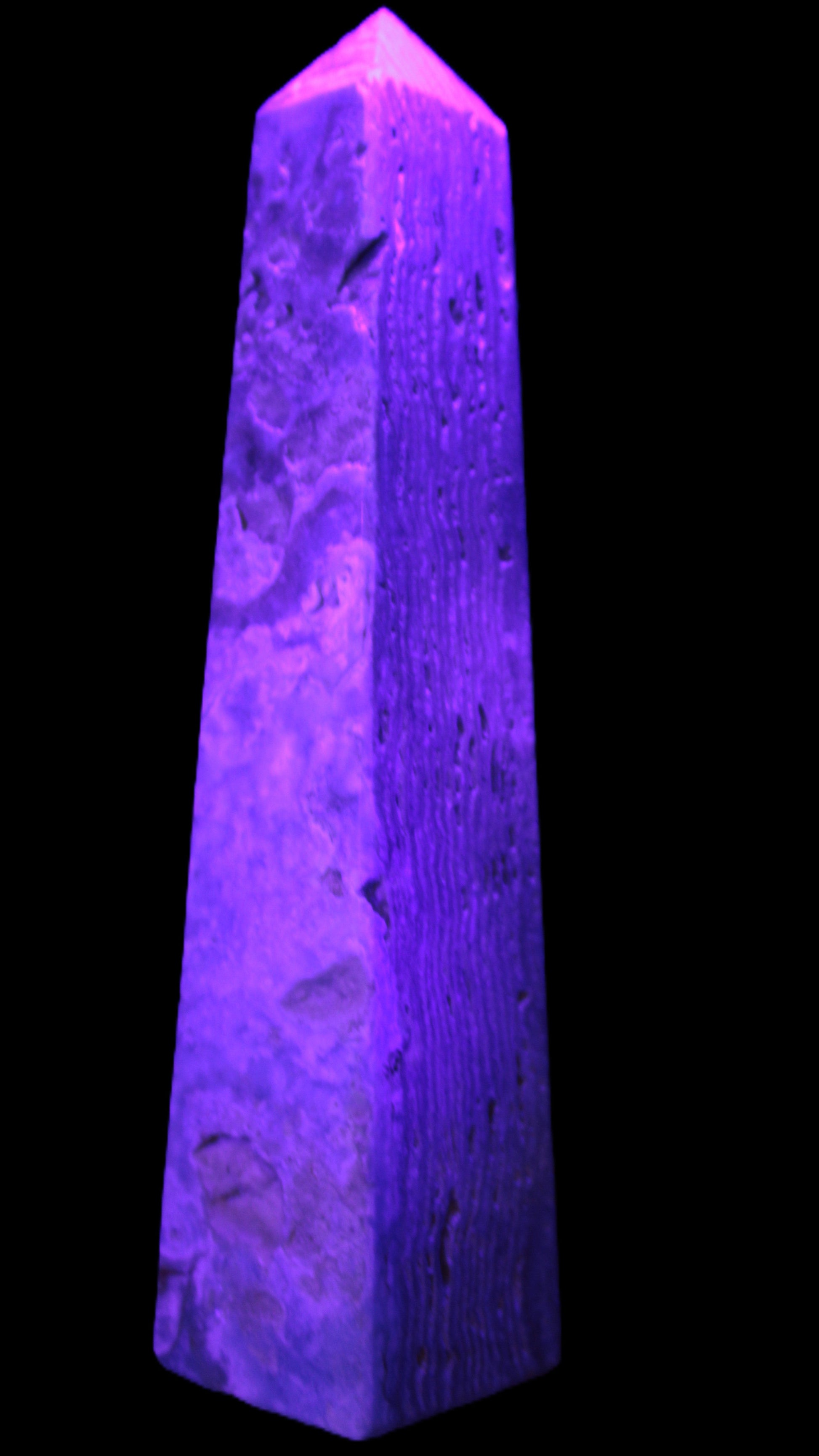 Caribbean Calcite obelisk 263*54*56mm 1271g in UV light - Rocks and Things Store