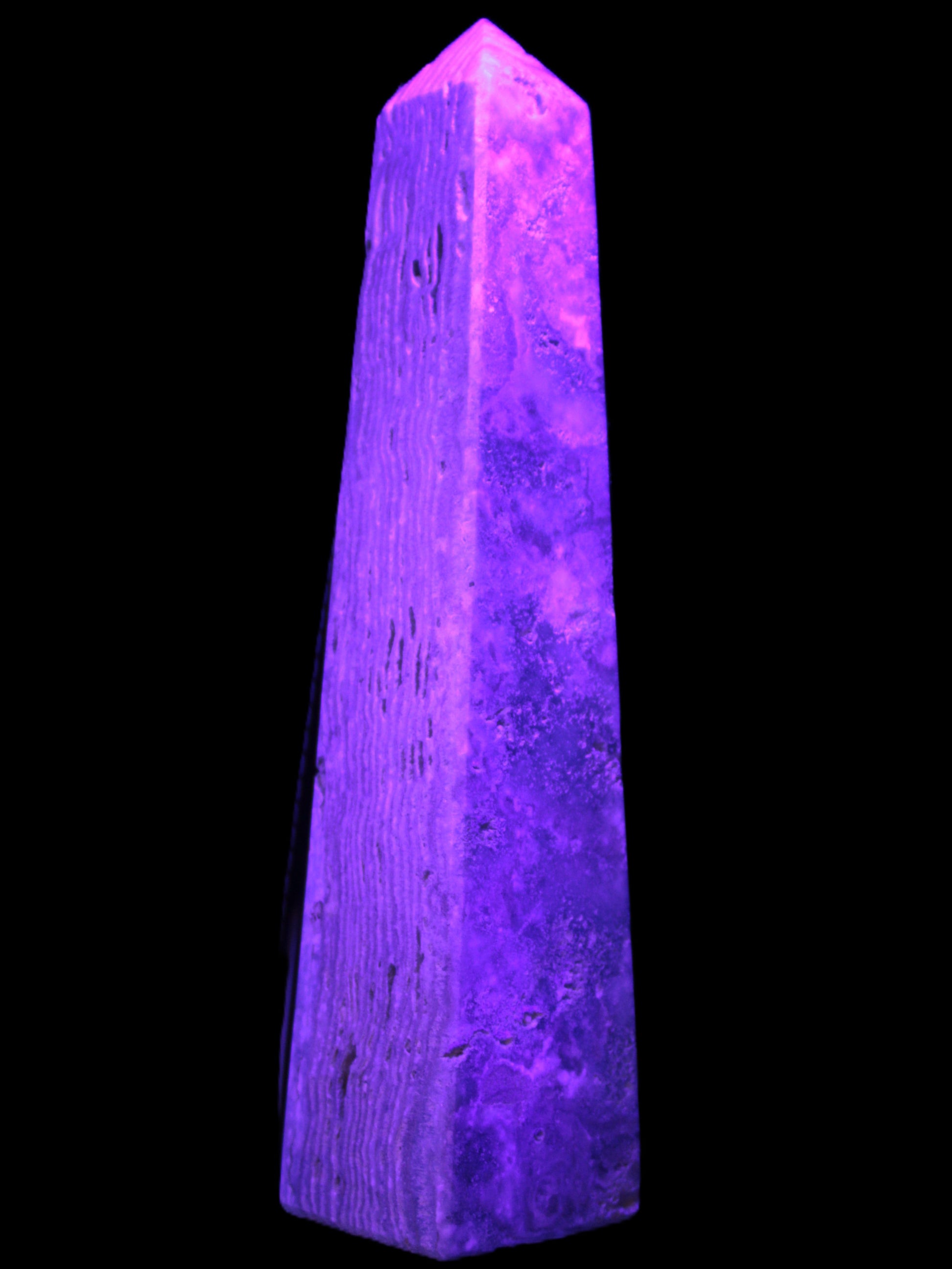 Caribbean Calcite obelisk 263*54*56mm 1271g in UV light - Rocks and Things Store