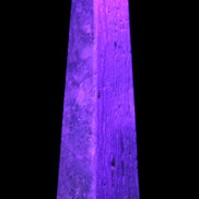 Caribbean Calcite obelisk 263*54*56mm 1271g in UV light - Rocks and Things Store