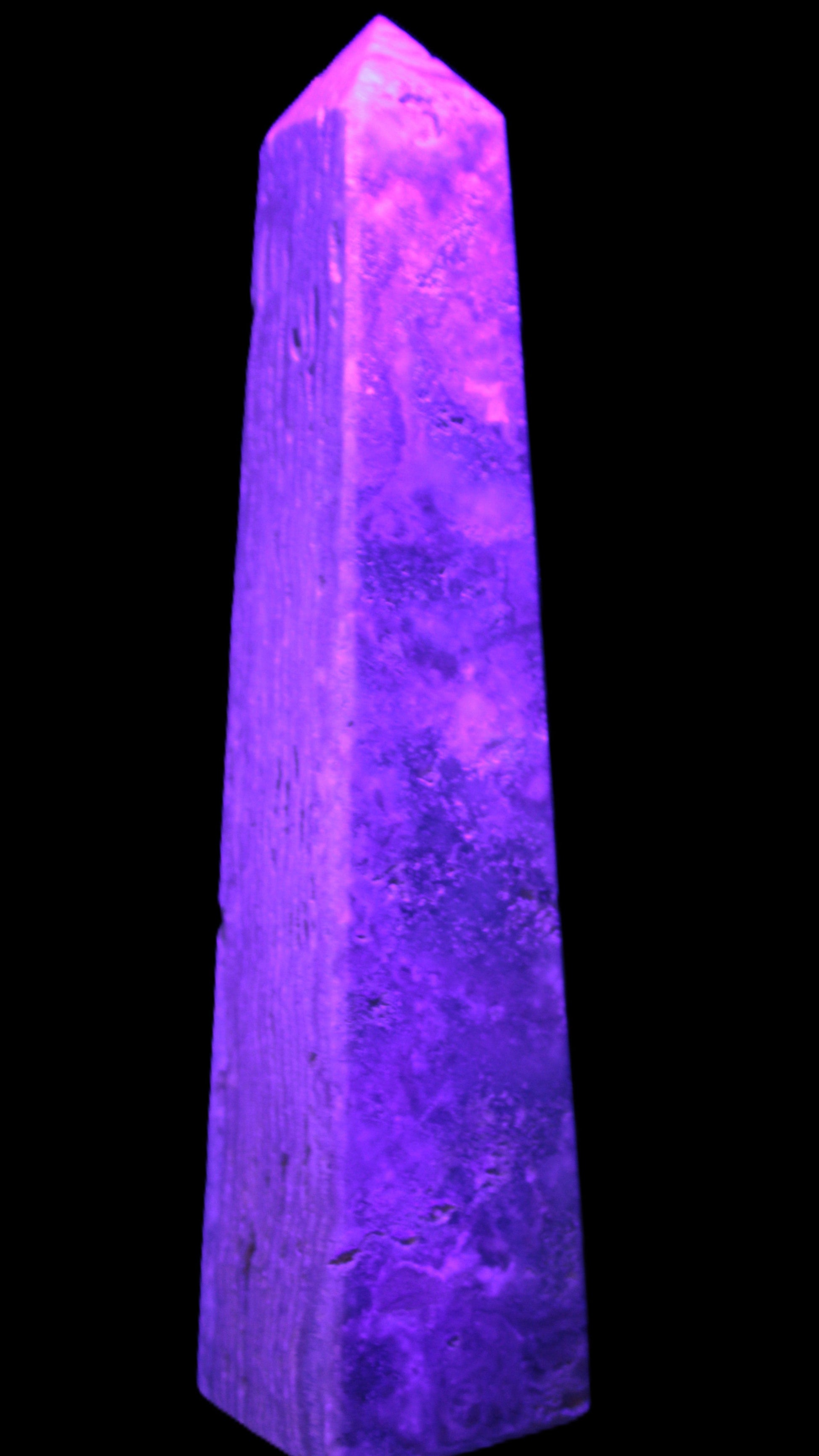 Caribbean Calcite obelisk 263*54*56mm 1271g in UV light - Rocks and Things Store