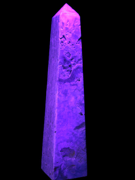 Caribbean Calcite obelisk 263*54*56mm 1271g in UV light - Rocks and Things Store