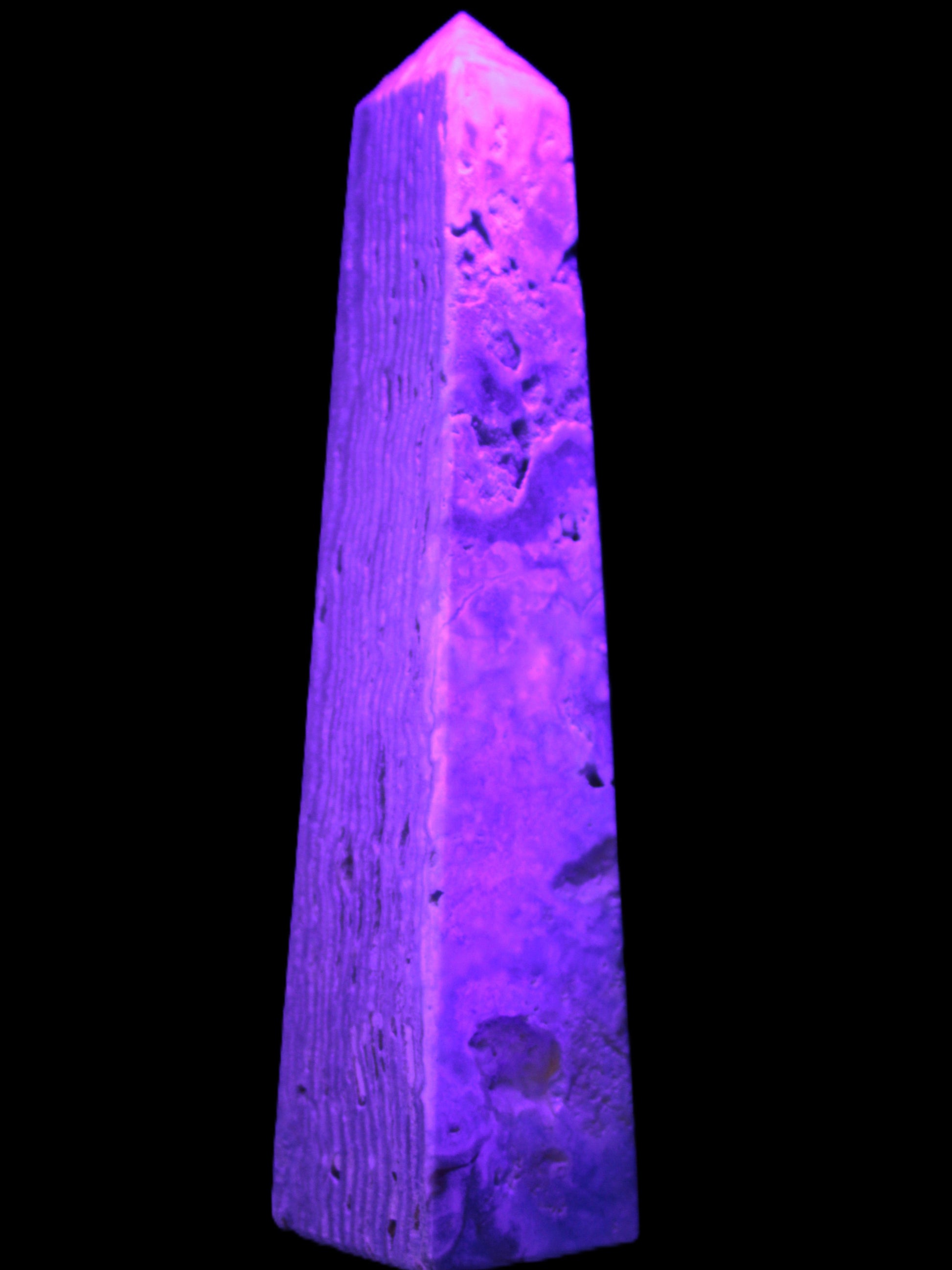 Caribbean Calcite obelisk 263*54*56mm 1271g in UV light - Rocks and Things Store