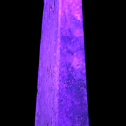 Caribbean Calcite obelisk 263*54*56mm 1271g in UV light - Rocks and Things Store