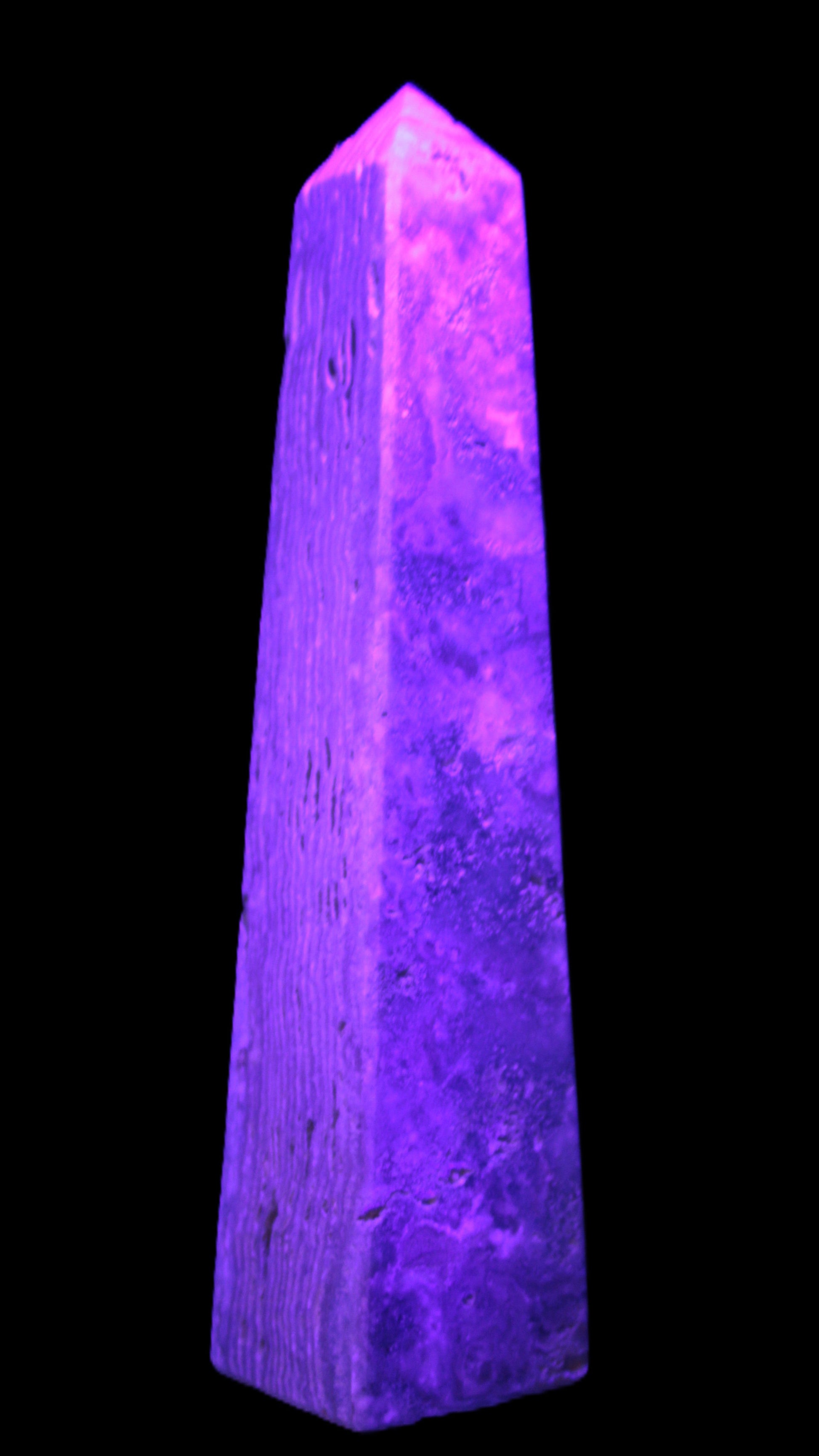 Caribbean Calcite obelisk 263*54*56mm 1271g in UV light - Rocks and Things Store