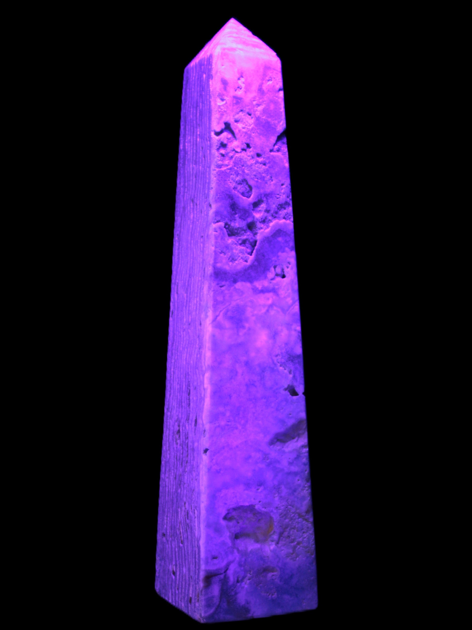 Caribbean Calcite obelisk 263*54*56mm 1271g in UV light - Rocks and Things Store