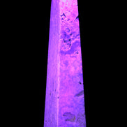 Caribbean Calcite obelisk 263*54*56mm 1271g in UV light - Rocks and Things Store