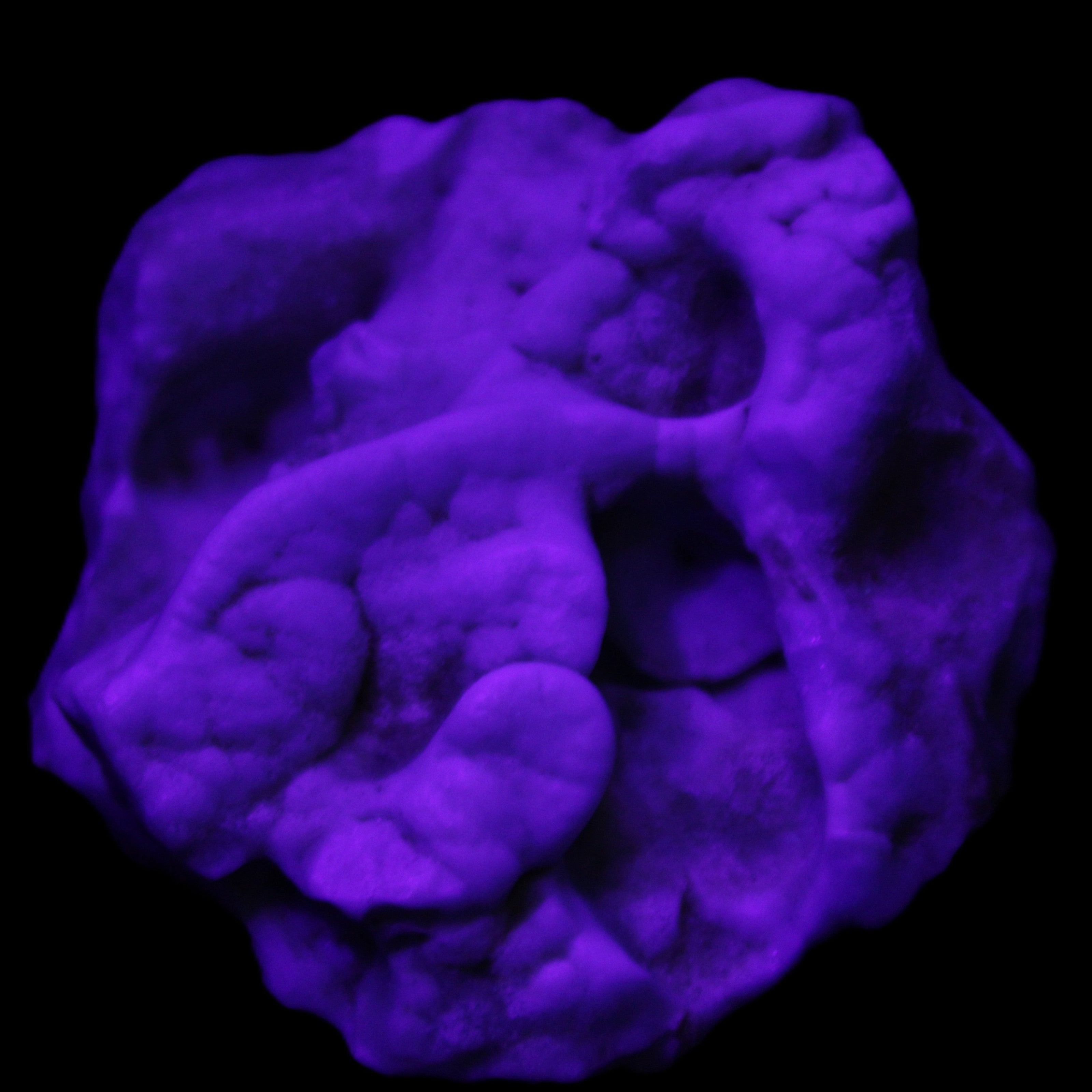 Blue Aragonite specimen 68*40*65mm 156.7g in UV light - Rocks and Things Store