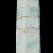Pistachio Calcite obelisk 131*37*30mm 324g in sunlight - Rocks and Things Store
