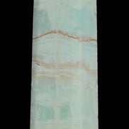Pistachio Calcite obelisk 131*37*30mm 324g in sunlight - Rocks and Things Store
