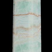 Pistachio Calcite obelisk 131*37*30mm 324g in sunlight - Rocks and Things Store