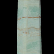 Pistachio Calcite obelisk 131*37*30mm 324g in sunlight - Rocks and Things Store