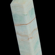 Pistachio Calcite obelisk 131*37*30mm 324g in sunlight - Rocks and Things Store