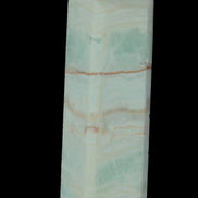 Pistachio Calcite obelisk 131*37*30mm 324g in sunlight - Rocks and Things Store