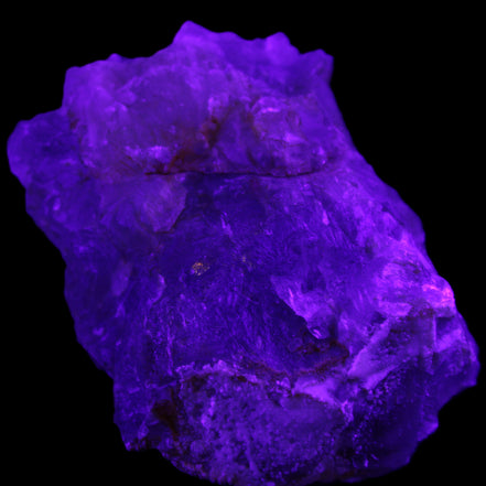 Clear Fluorite cubic stepped cluster 104*72*50mm 660g in UV light - Rocks and Things Store
