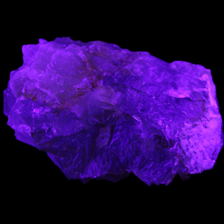 Clear Fluorite cubic stepped cluster 104*72*50mm 660g in UV light - Rocks and Things Store
