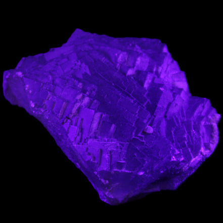 Clear Fluorite cubic stepped cluster 104*72*50mm 660g in UV light - Rocks and Things Store