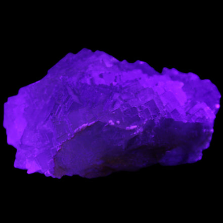 Clear Fluorite cubic stepped cluster 104*72*50mm 660g in UV light - Rocks and Things Store