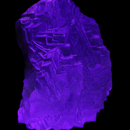 Clear Fluorite cubic stepped cluster 104*72*50mm 660g in UV light - Rocks and Things Store