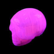 Mangano Calcite skull 31*47*40mm 87g in UV light - Rocks and Things Store