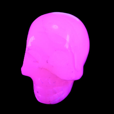 Mangano Calcite skull 31*47*40mm 87g in UV light - Rocks and Things Store