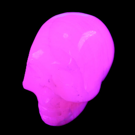 Mangano Calcite skull 31*47*40mm 87g in UV light - Rocks and Things Store