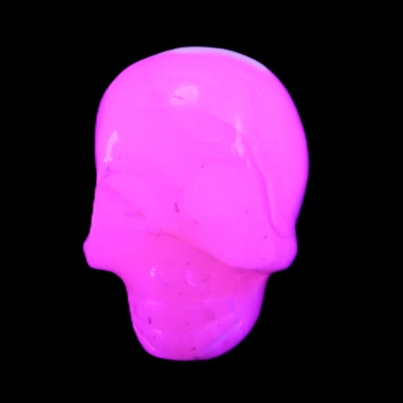 Mangano Calcite skull 31*47*40mm 87g in UV light - Rocks and Things Store